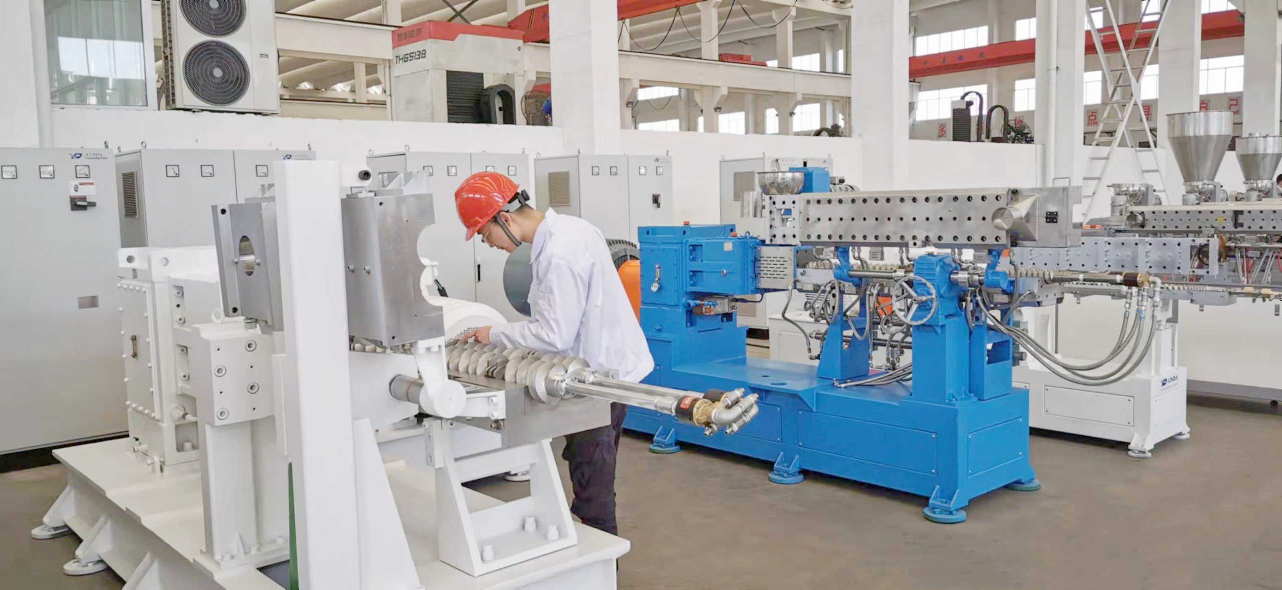 Xinda Twin Screw Extruder Twin screw extruder_clam shell barrel type